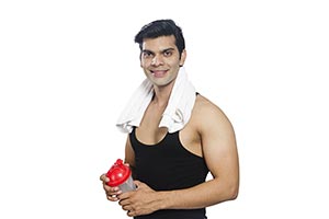 Handsome Fitness Man Holding Bottle Water