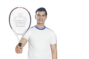 Indian Man Tennis Player Showing Racket