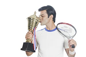 Indian Male Tennis Player Kissing Trophy