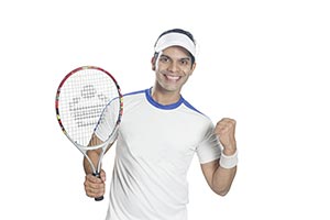 Portrait Happy Male Tennis Player Celebrating Succ