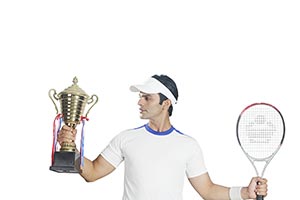 Man Tennis Player Holding Winners Trophy