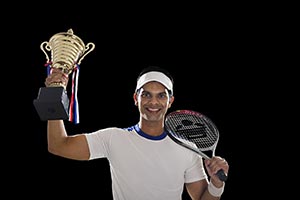 Man Tennis Player Celebrates Championship Trophy