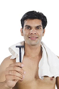 Man Clean Shave Showing Razor