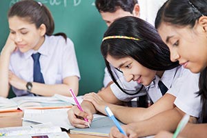 Teenage Students Studying School