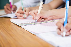 School Students Textbook Writing