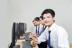 School Students Studying Computer