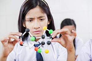 School Girl Student Learning Atom