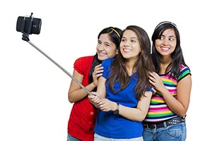 Friends Taking Selfie Smartphone Stick