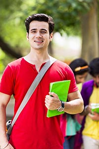 Teenager College Boy Standing in the park