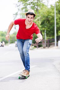 Boy Riding skateboard