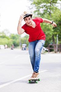 Boy Riding skateboard