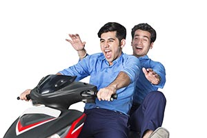 Teenagers Boys Riding Scooty