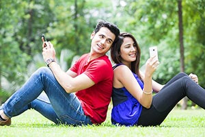 Couple Chatting Cell phone