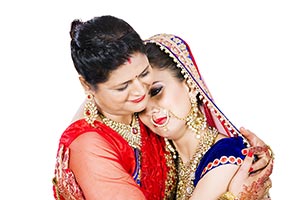 Mother Hugging Daughter Wedding