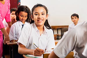 Adult Woman ; Book ; Classmate ; Classroom ; Color