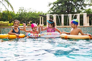 3-5 People ; Arms Raised ; Bathing ; Bonding ; Boy