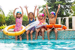 3-5 People ; Arms Raised ; Bonding ; Boys ; Cap ; 